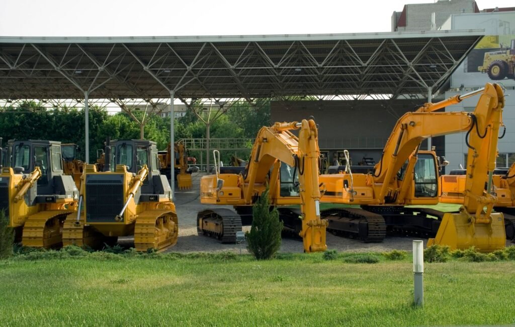 Plant and machinery parked in an outdoor equipment yard