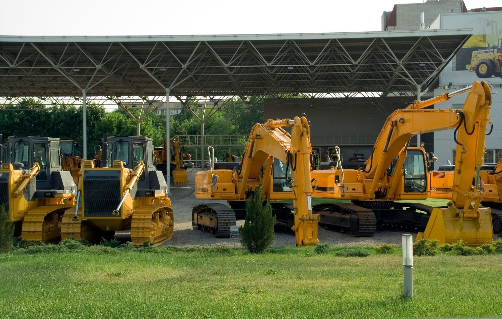 Plant and machinery parked in an outdoor equipment yard